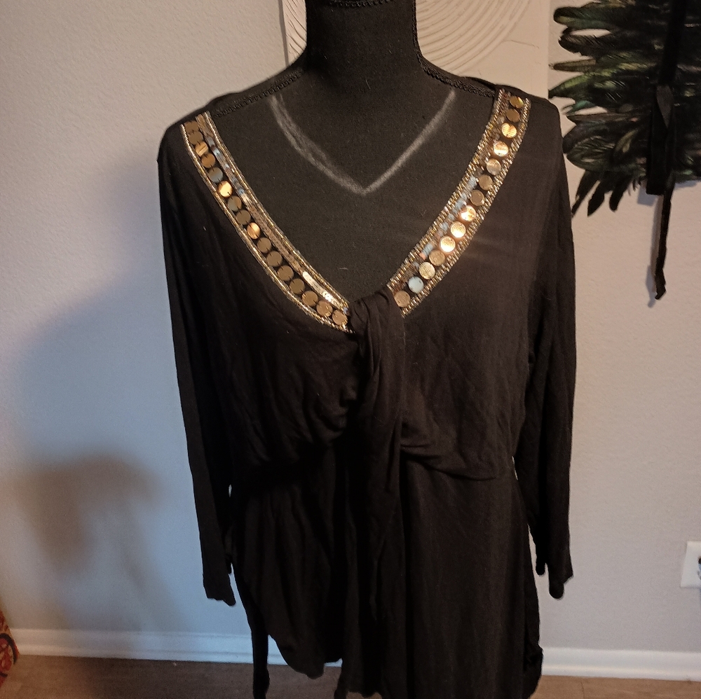 Elegant Black Top with Gold Accents